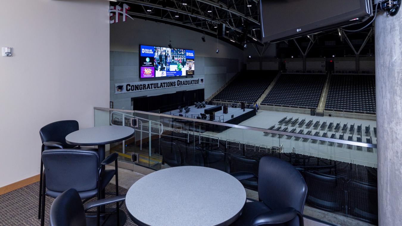 View from inside an arena view suite that is overlooking the arena.